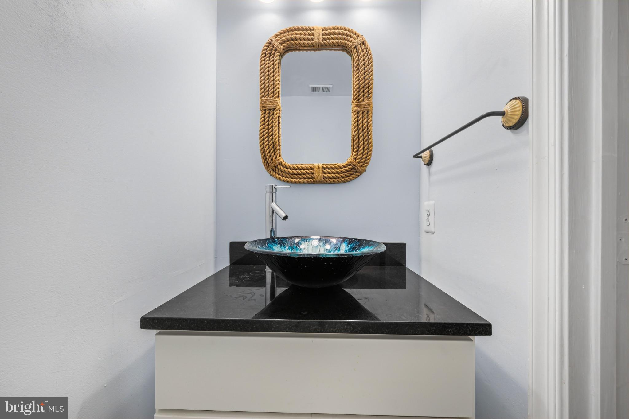 Chic bathroom with vibrant accents.