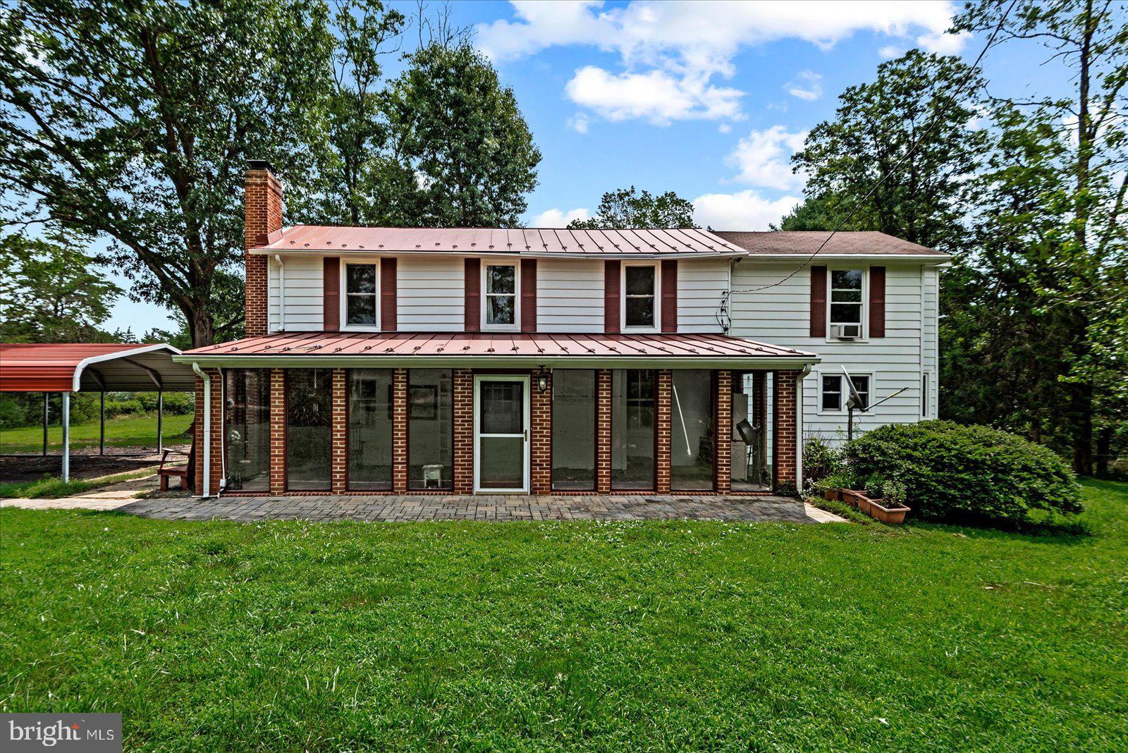 31934 Indiantown Road Locust Grove, VA 22508 - Photo 9 of 84 Charming home with lush greenery.