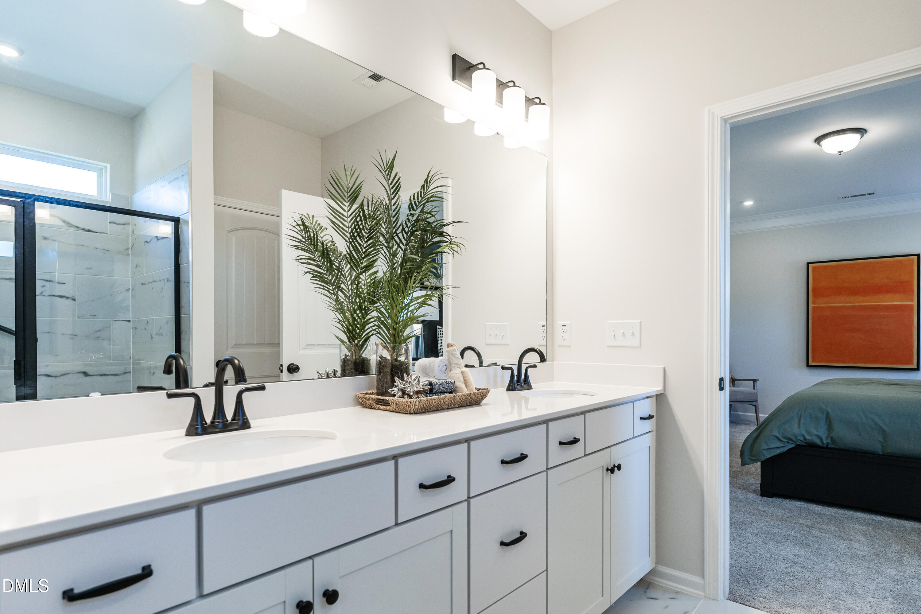 308 Spirit Spgs Road Smithfield, NC 27577 - Photo 15 of 21 a bathroom with double sink and a mirror