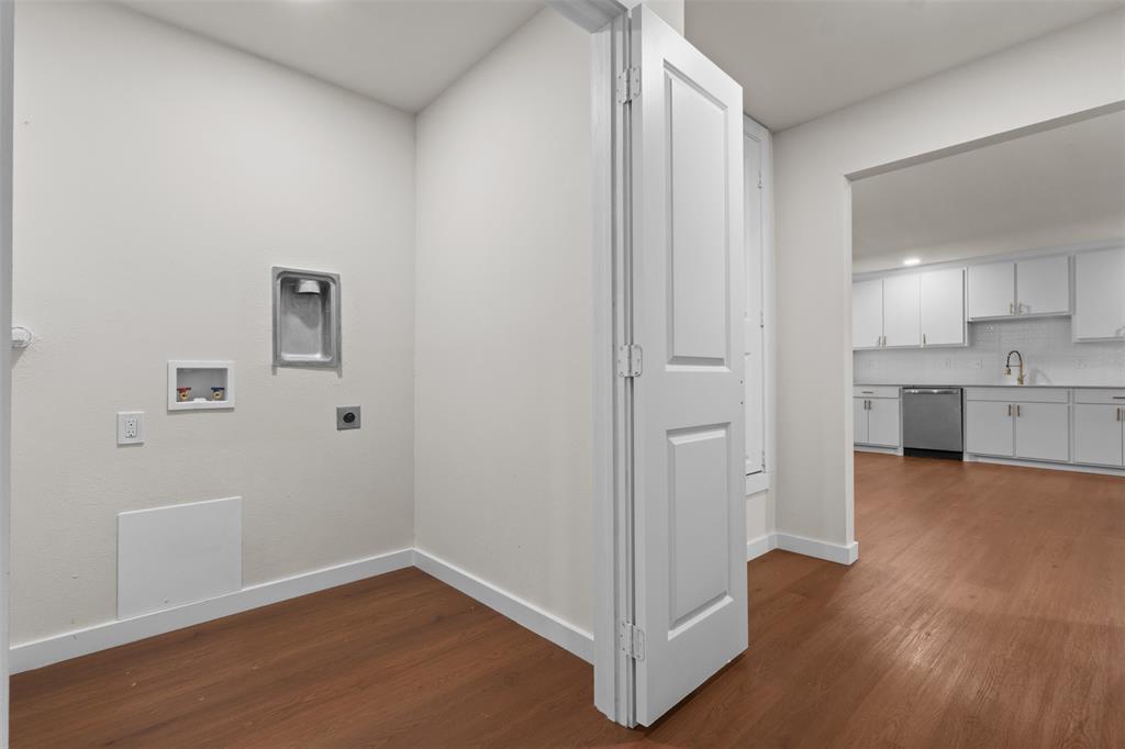 513 East Union Bower Road Irving, TX 75061 - Photo 25 of 34 Laundry area with wood-finish flooring