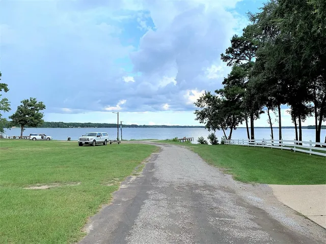 a view of a lake from a yard