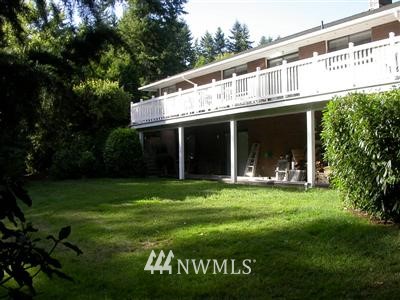 4515 174th Street Southeast Bothell, WA 98012 - Photo 1 of 1 a front view of a house with a garden