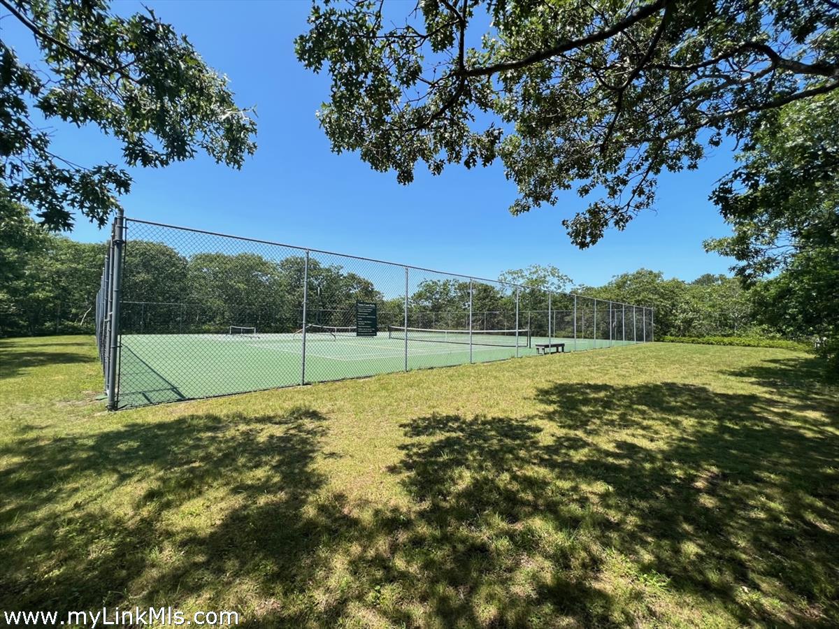 4 Jacob's Neck Road Edgartown, MA 02539 - Photo 19 of 20 a view of a field with a tree