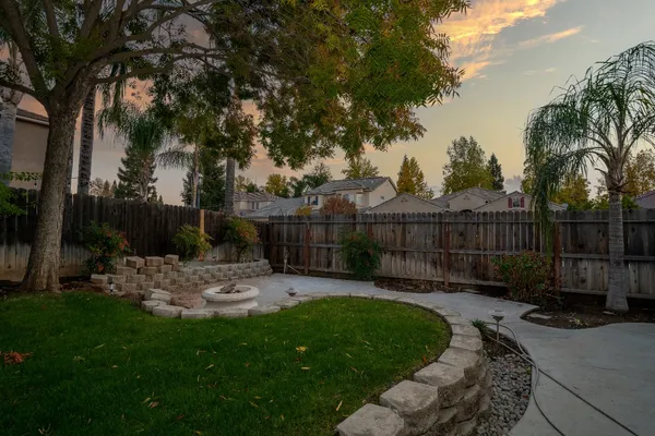 a view of a backyard with a garden