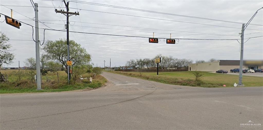 0 East Canton Road Donna, TX 78537 - Photo 12 of 12 View of asphalt road with traffic lights and traffic signs