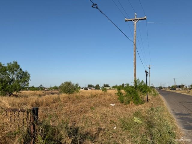 0 East Canton Road Donna, TX 78537 - Photo 8 of 12 View of asphalt road featuring a rural view