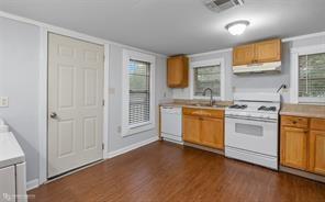 814 Lee Street Benton, LA 71006 - Photo 11 of 20 a view of a kitchen with stove top oven