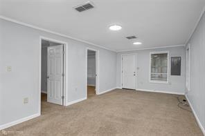 814 Lee Street Benton, LA 71006 - Photo 4 of 20 a view of an empty room with a window