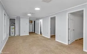 a view of empty room with windows