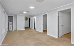 814 Lee Street Benton, LA 71006 - Photo 6 of 20 a view of empty room with windows