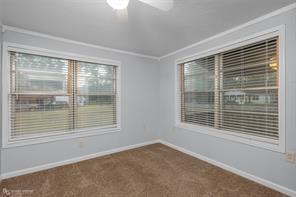 814 Lee Street Benton, LA 71006 - Photo 7 of 20 a view of an empty room with a window