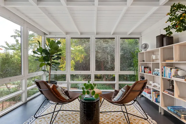 a view of a livingroom with furniture