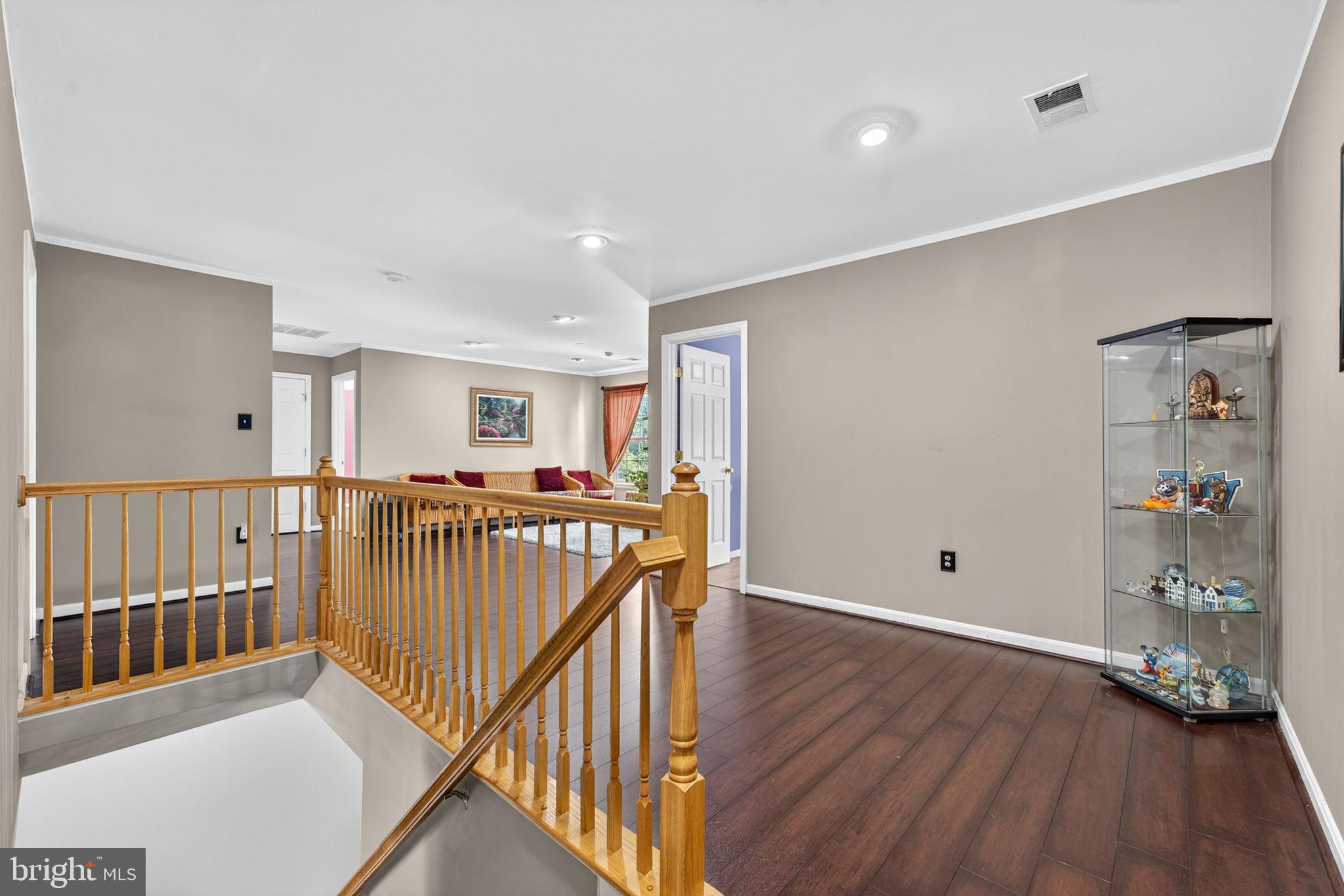 751 Holly Leaf Road Culpeper, VA 22701 - Photo 29 of 65 a view of a hallway with wooden floor and entryway