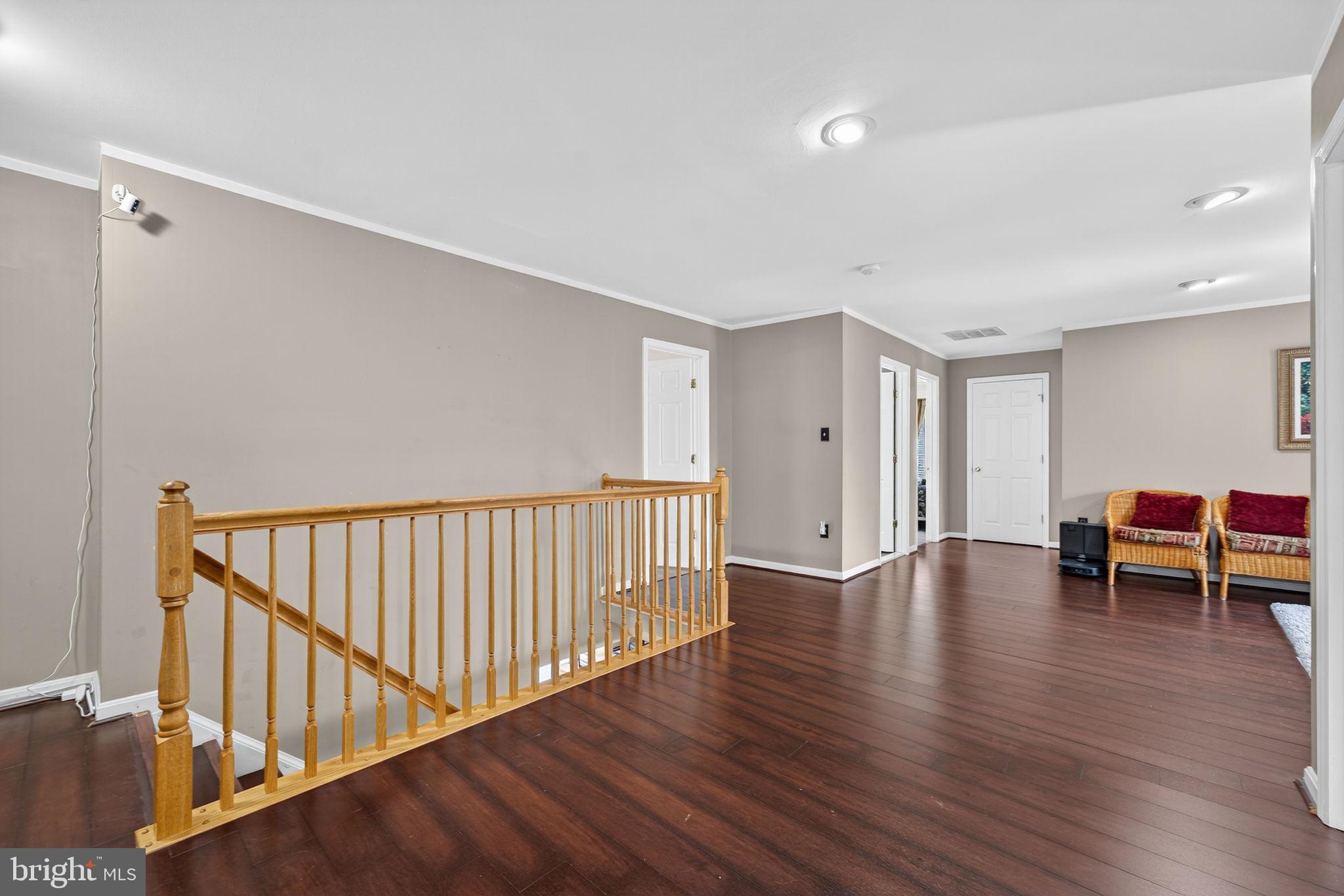751 Holly Leaf Road Culpeper, VA 22701 - Photo 30 of 65 a view of a livingroom with furniture and wooden floor