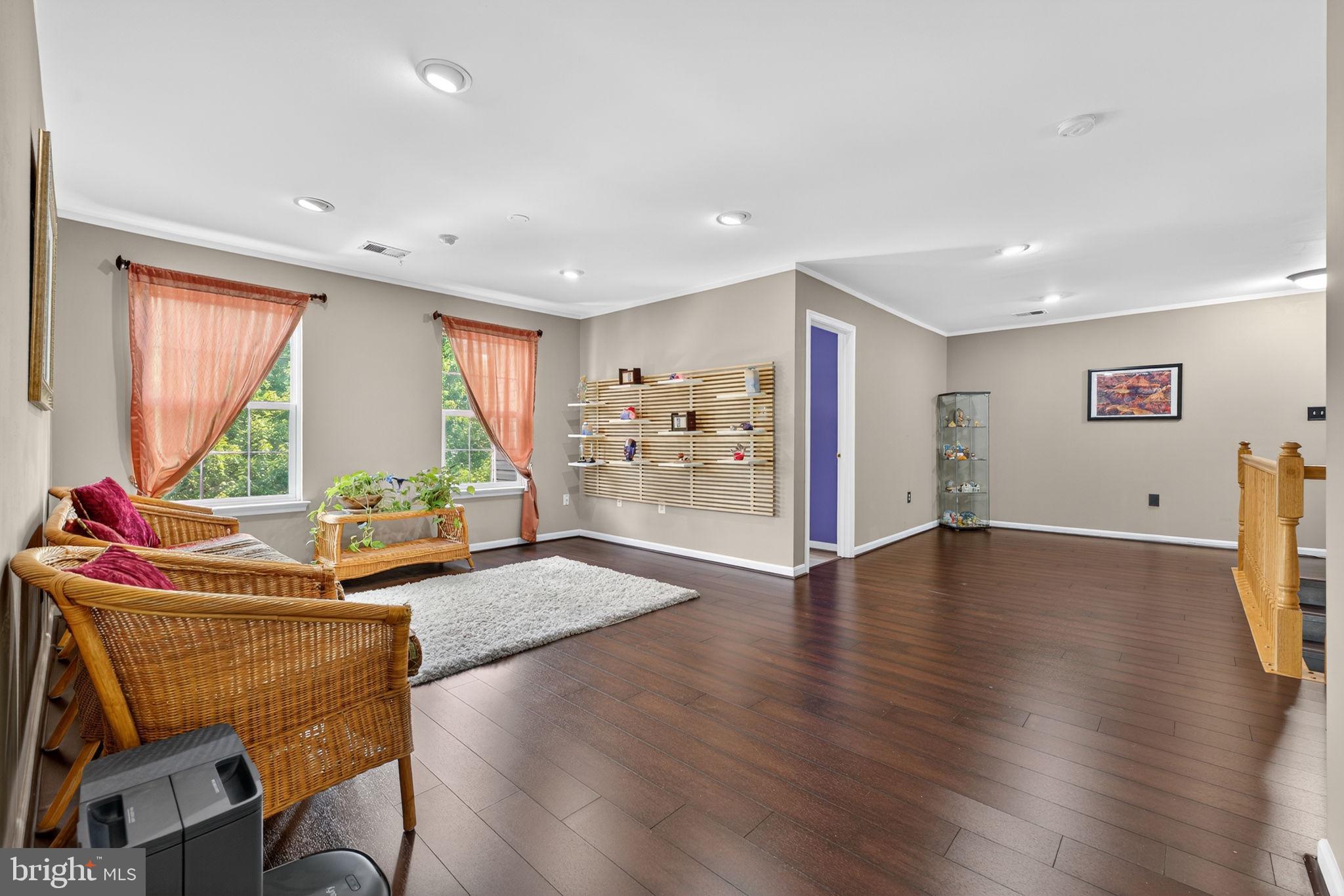 751 Holly Leaf Road Culpeper, VA 22701 - Photo 35 of 65 a living room with furniture and a large window