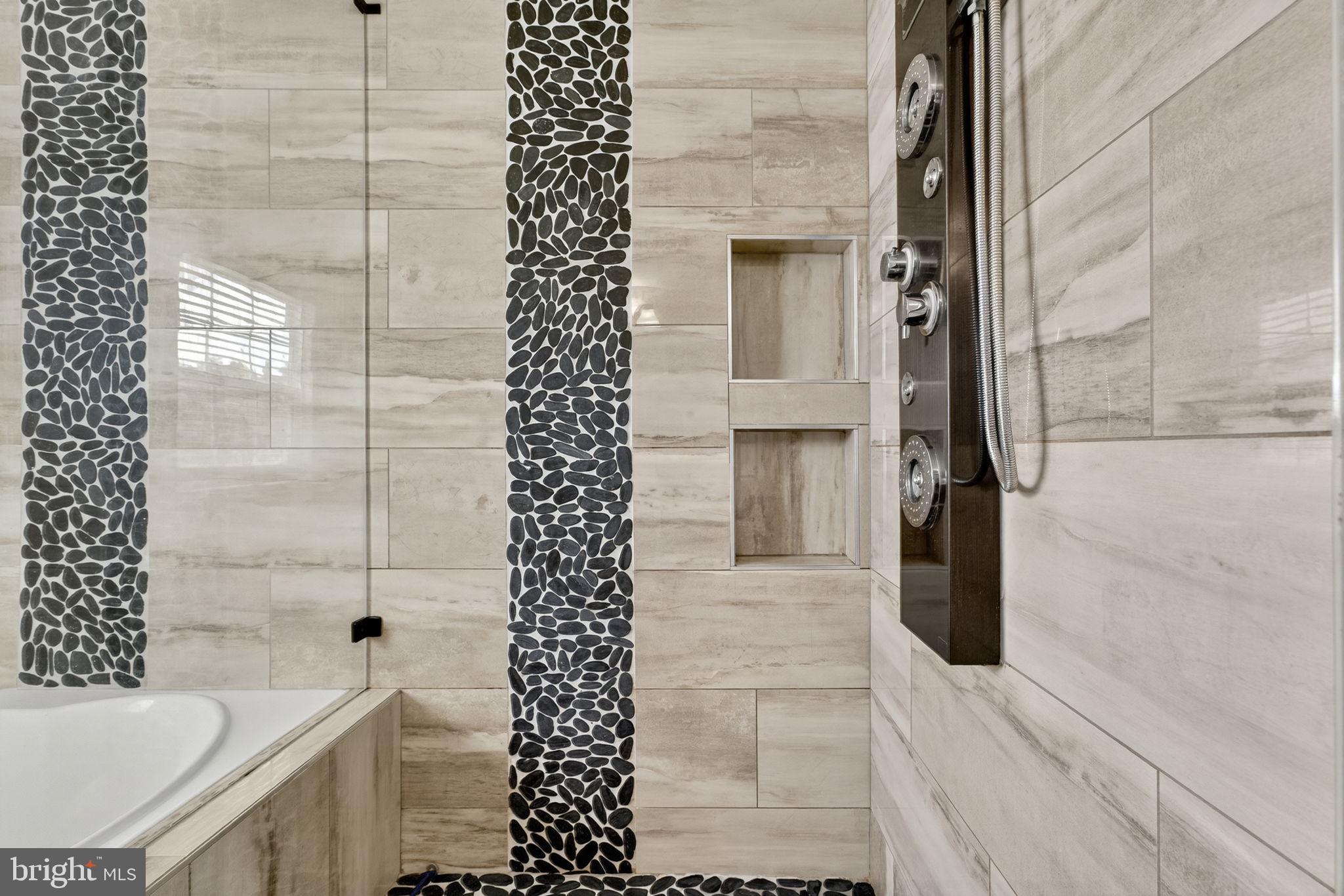 751 Holly Leaf Road Culpeper, VA 22701 - Photo 41 of 65 a bathroom with a bathtub and shower