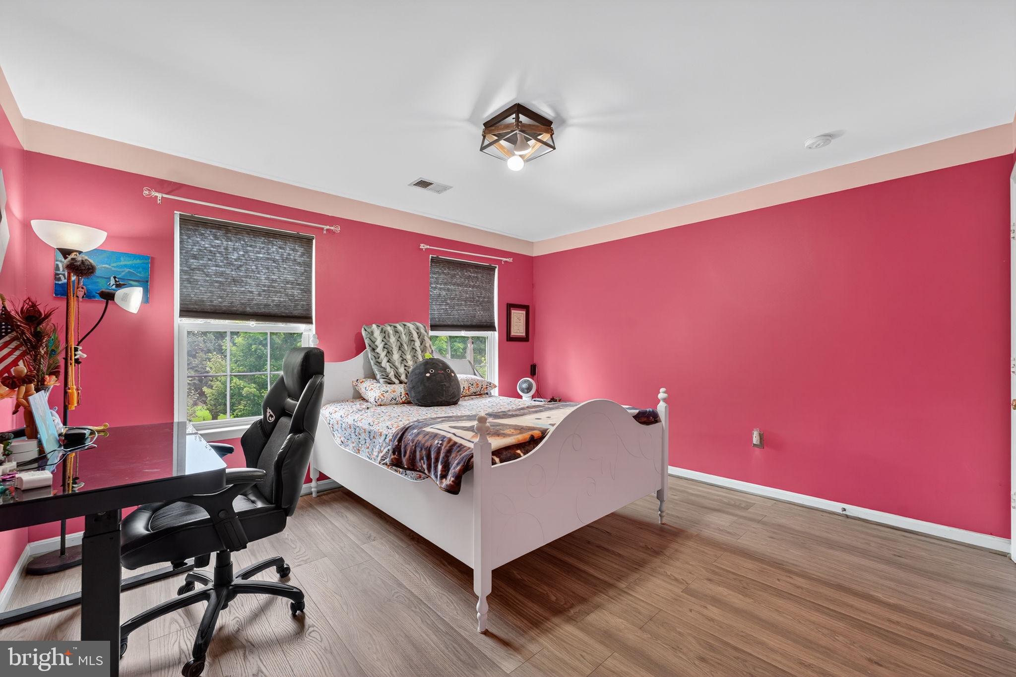 751 Holly Leaf Road Culpeper, VA 22701 - Photo 46 of 65 a living room with furniture and a potted plant