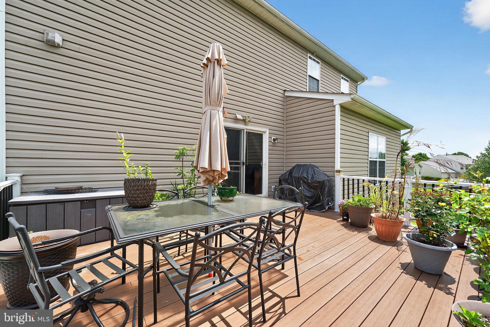 751 Holly Leaf Road Culpeper, VA 22701 - Photo 61 of 65 a view of a house with patio and wooden floor