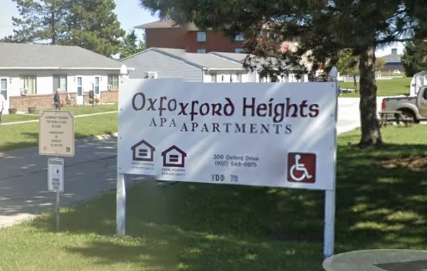 a sign broad on the side of the road