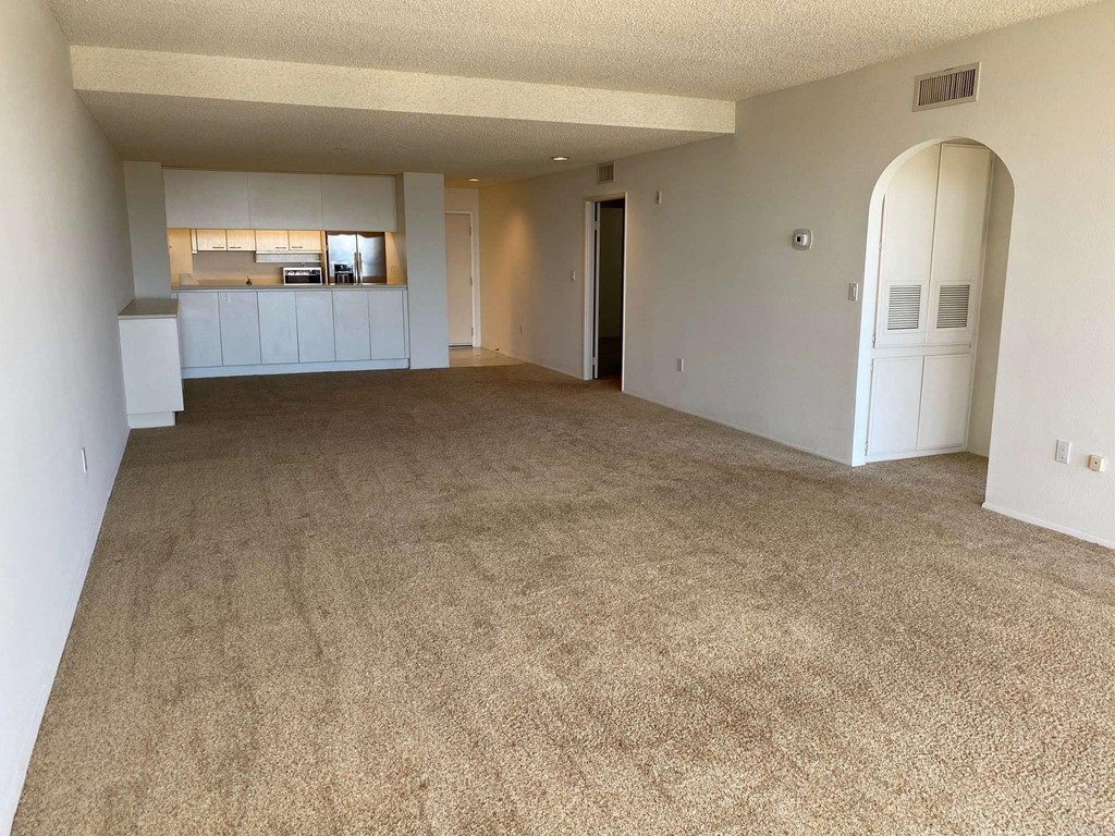 2500 Torrey Pines Road, Unit 1002 La Jolla, CA 92037 - Photo 2 of 8 a view of a room with furniture and window