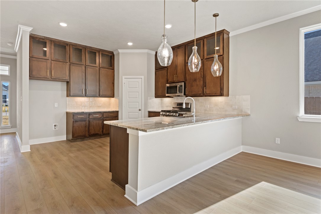 4245 Appalachian Trail Bryan, TX 77802 - Photo 12 of 30 a view of kitchen with sink microwave and refrigerator