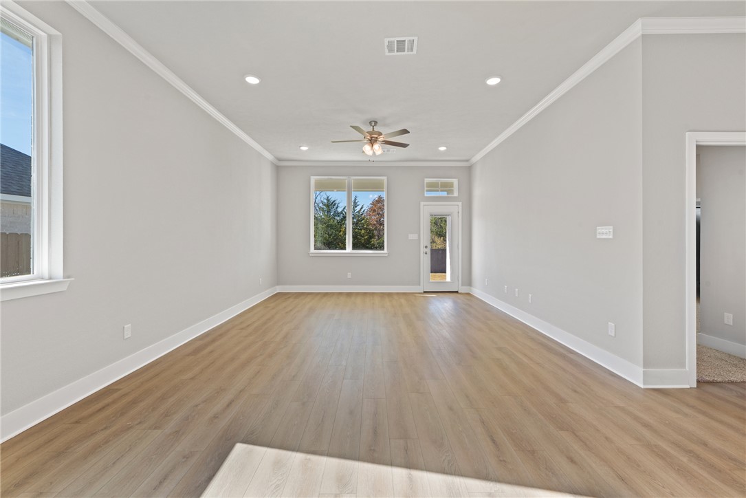 4245 Appalachian Trail Bryan, TX 77802 - Photo 17 of 30 wooden floor in an empty room with a window