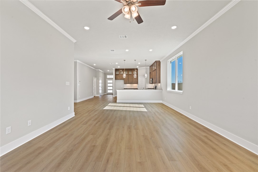 4245 Appalachian Trail Bryan, TX 77802 - Photo 20 of 30 wooden floor in an empty room with a window