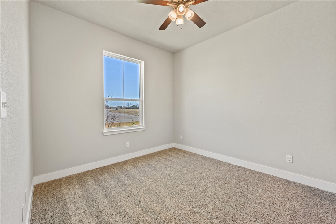 4245 Appalachian Trail Bryan, TX 77802 - Photo 5 of 30 an empty room with a window