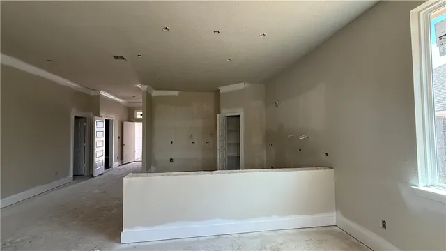a view of a bathtub in a hallway