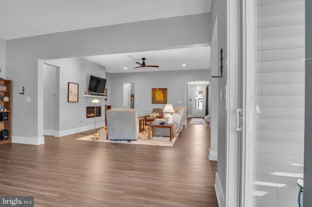 a kitchen with stainless steel appliances granite countertop sink stove and wooden cabinets