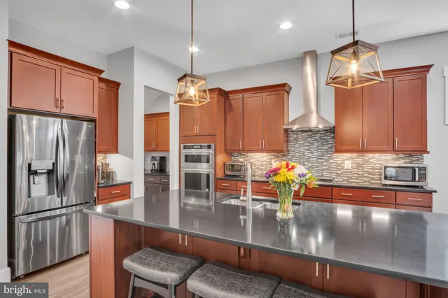 a bedroom with a bed and a television