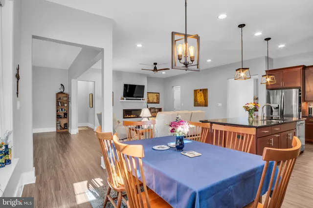 a bedroom that has a bed and a chair in it