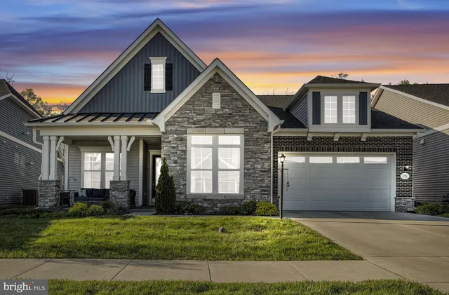 an aerial view of a house with outdoor space