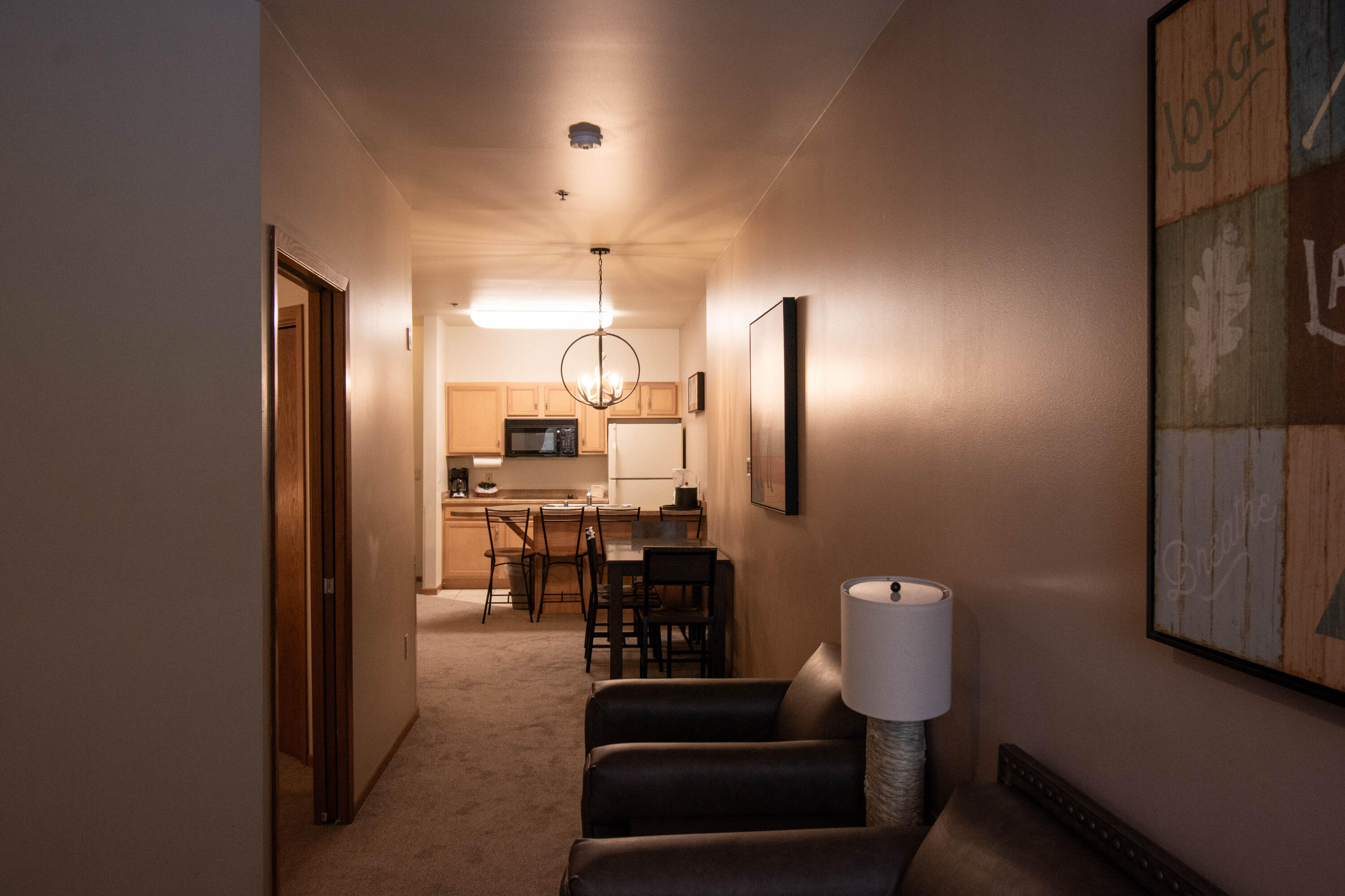 7020 Grand Geneva Way, Unit 137 Lyons, WI 53147 - Photo 16 of 25 Living Room to Kichen