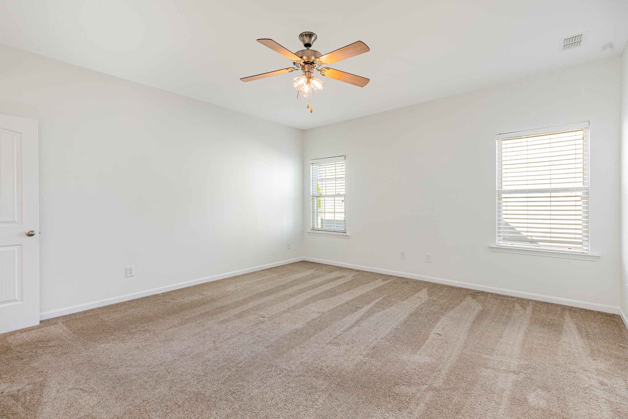 1087 Achiever Circle Spring Hill, TN 37174 - Photo 16 of 39 an empty room with window and ceiling fan