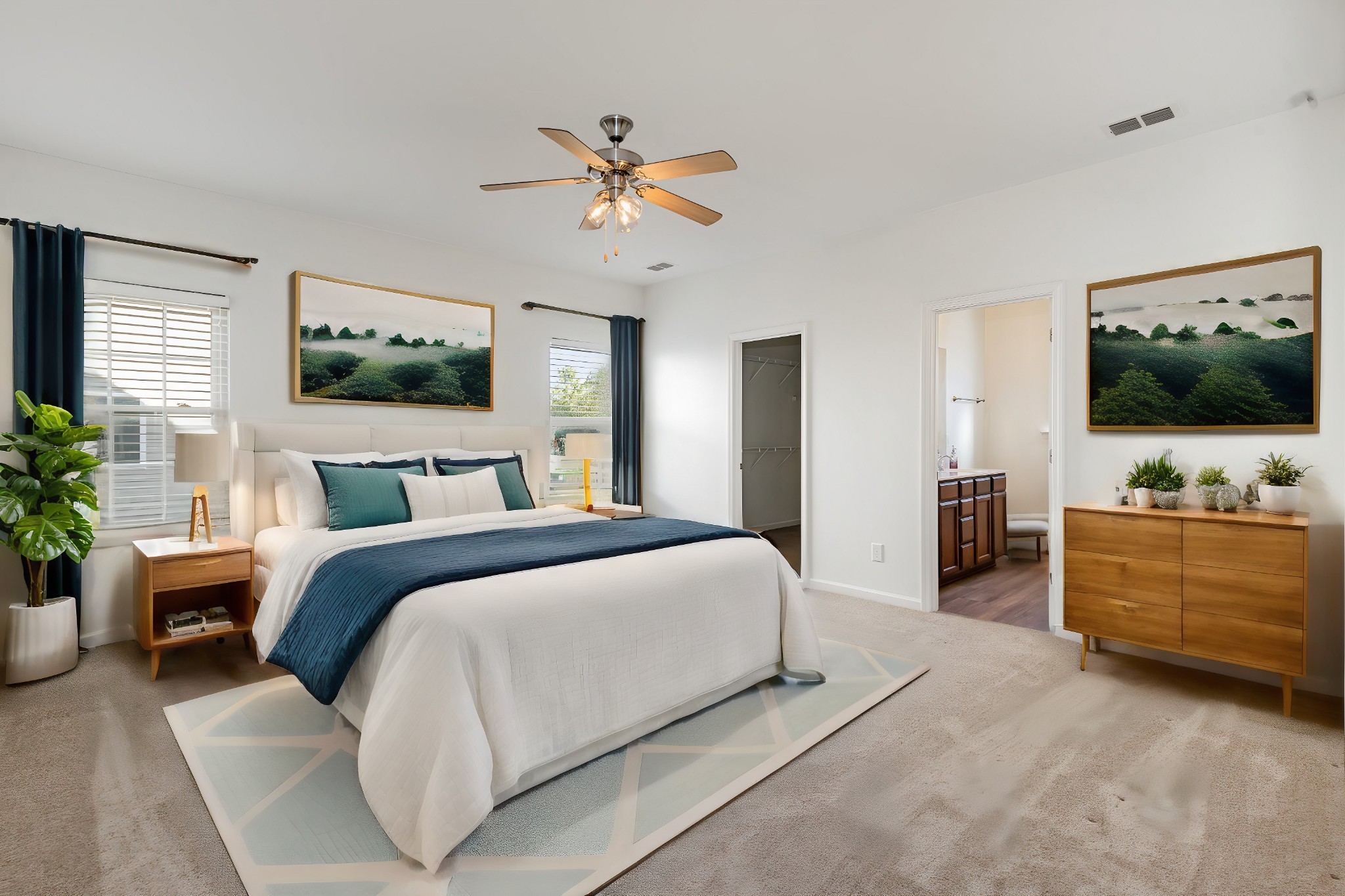 1087 Achiever Circle Spring Hill, TN 37174 - Photo 17 of 39 a bedroom with a bed and a flat screen tv