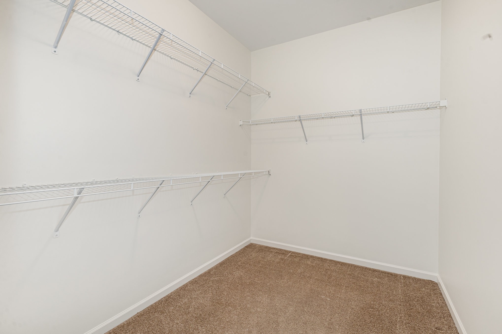 1087 Achiever Circle Spring Hill, TN 37174 - Photo 20 of 39 a view of a room with racks on the wall