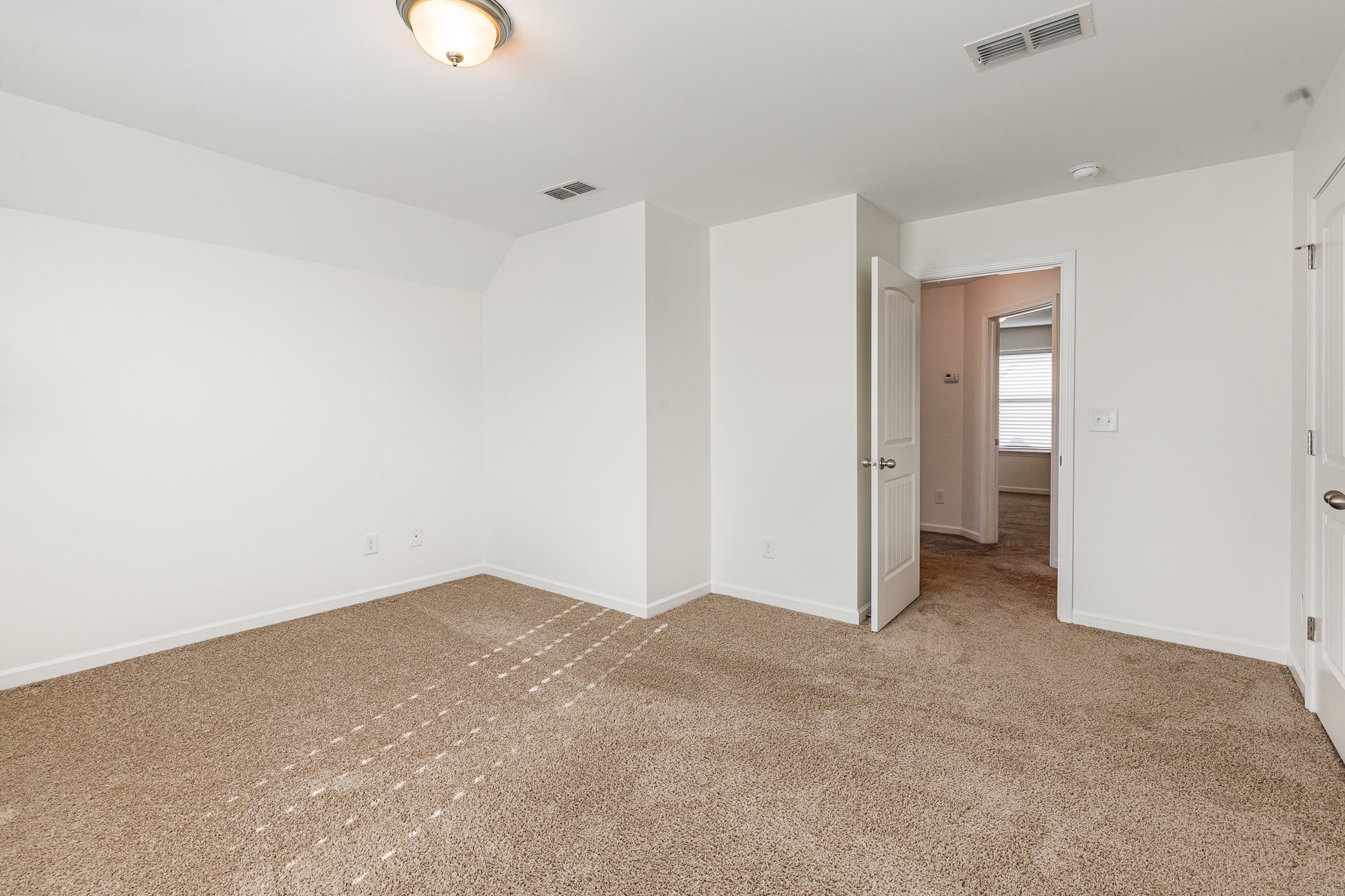 1087 Achiever Circle Spring Hill, TN 37174 - Photo 26 of 39 an empty room with an entryway