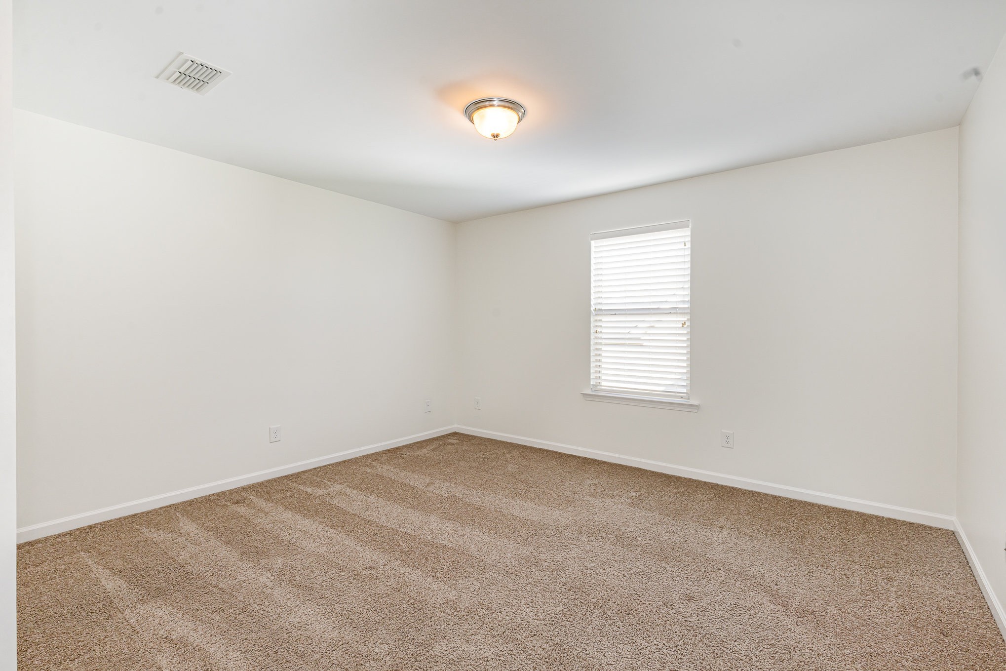 1087 Achiever Circle Spring Hill, TN 37174 - Photo 27 of 39 an empty room with windows