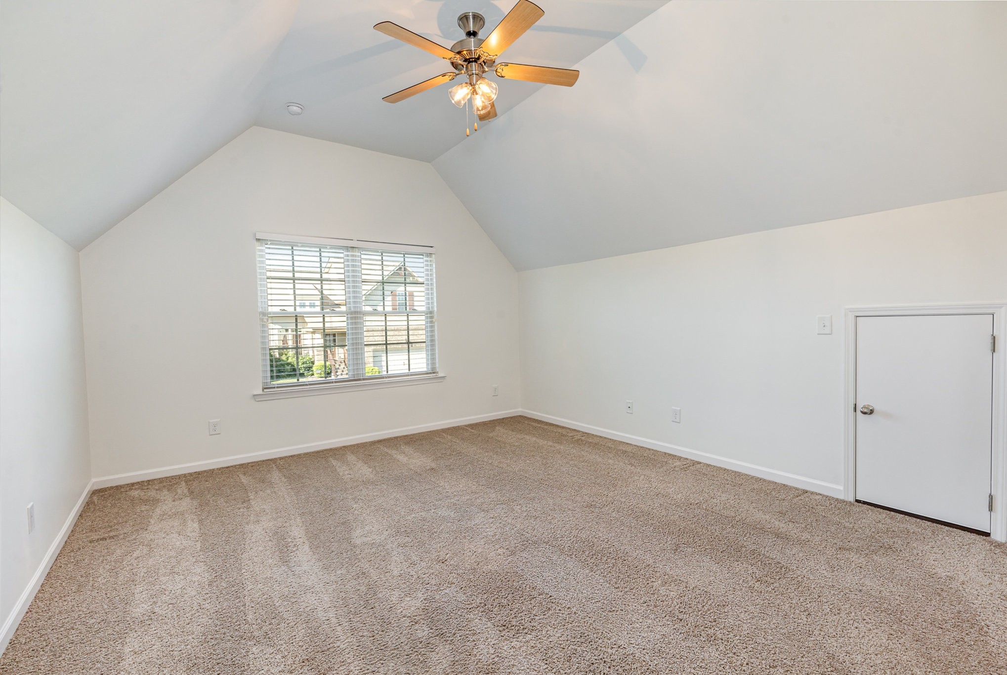 1087 Achiever Circle Spring Hill, TN 37174 - Photo 30 of 39 an empty room with windows and fan