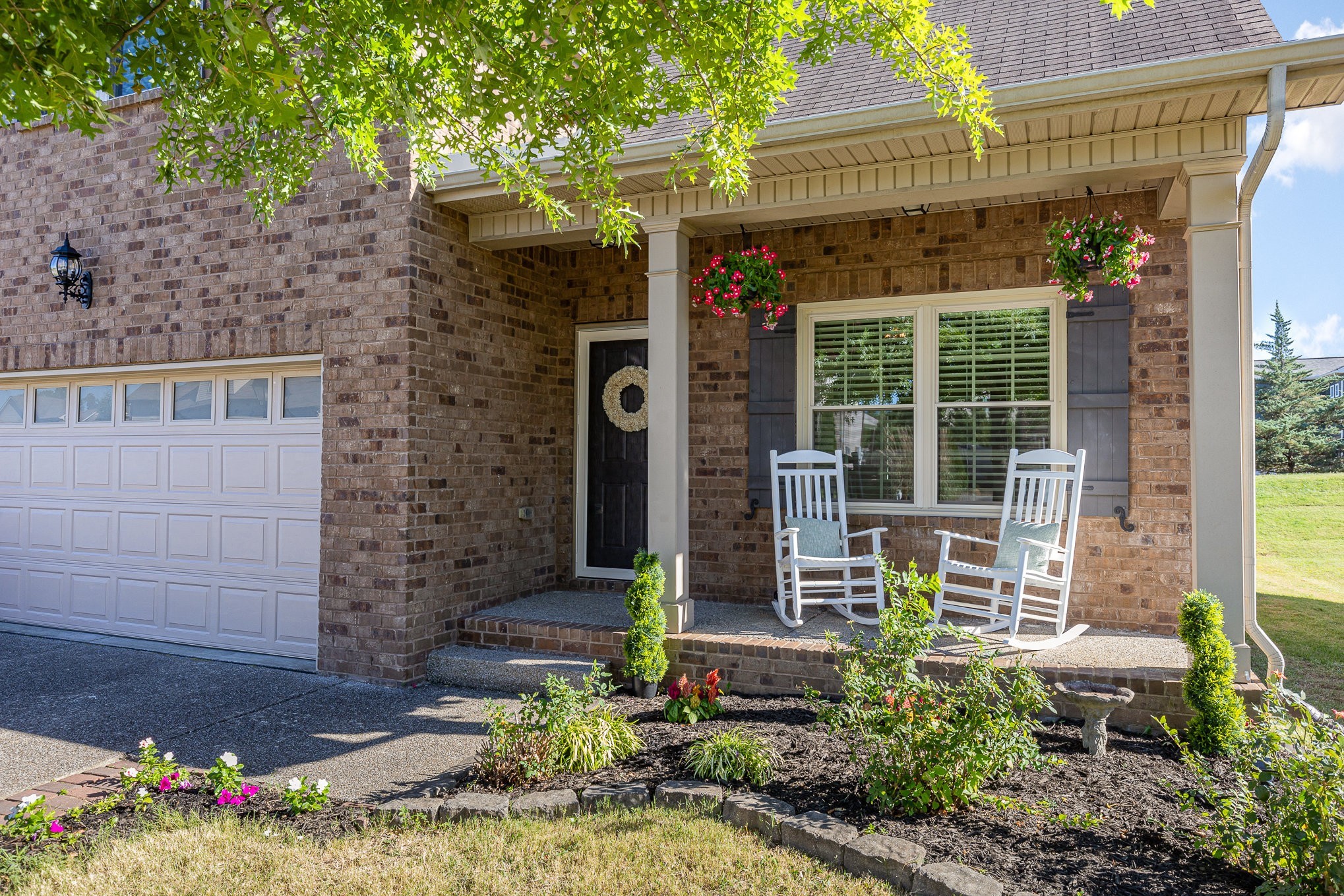 1087 Achiever Circle Spring Hill, TN 37174 - Photo 3 of 39 a front view of a house with a porch