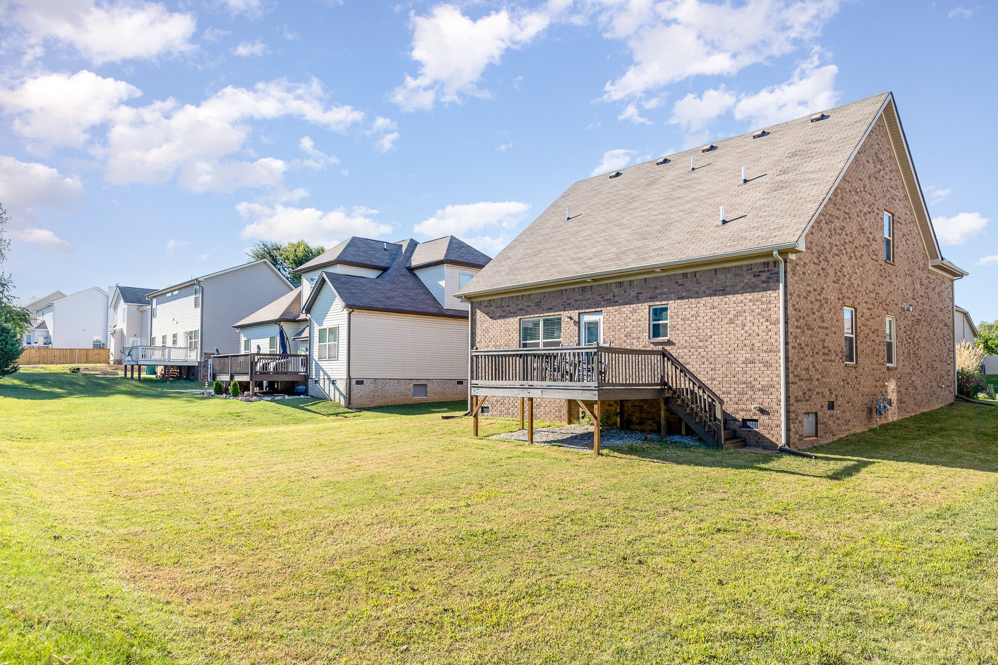 1087 Achiever Circle Spring Hill, TN 37174 - Photo 37 of 39 a house view with a swimming pool and wooden fence