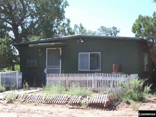 53 Acr 5270 Old Hunt Road Concho, AZ 85924 - Photo 2 of 4 a side view of a house