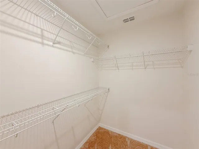a view of a room with racks on the wall