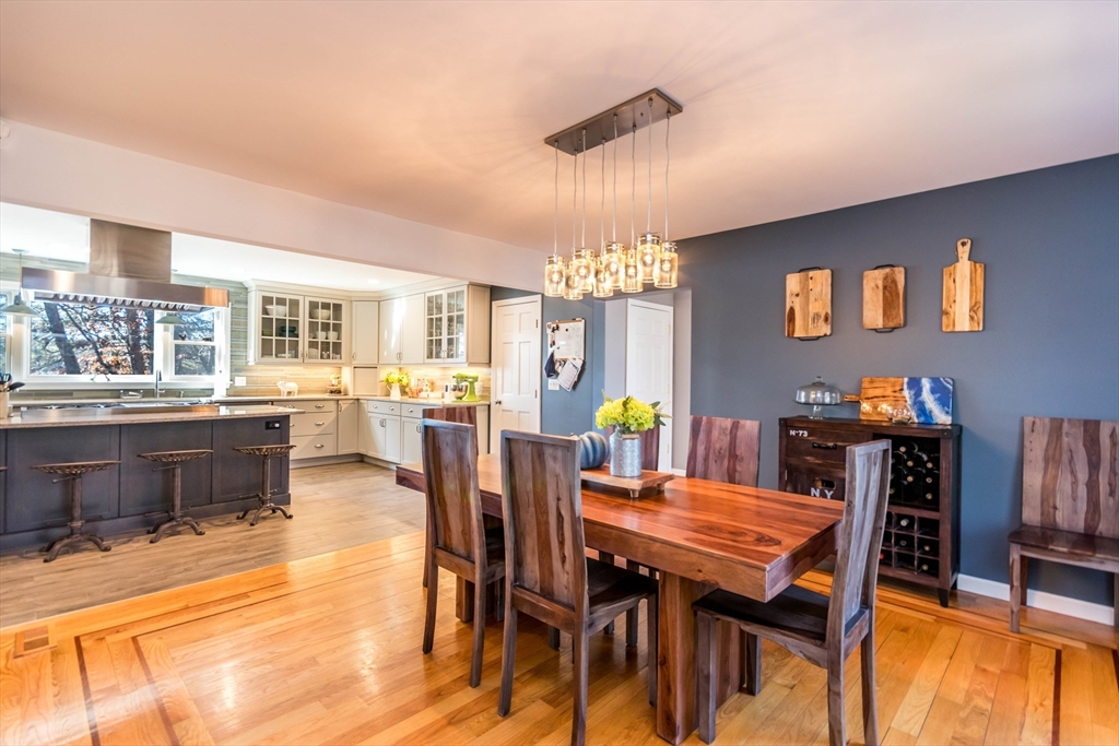 2 Blackmore Pond Circle Wareham, MA 02576 - Photo 11 of 42 a view of a dining room with furniture and chandelier