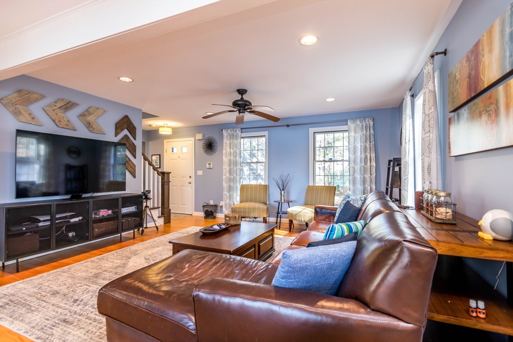 2 Blackmore Pond Circle Wareham, MA 02576 - Photo 15 of 42 a living room with furniture and a flat screen tv