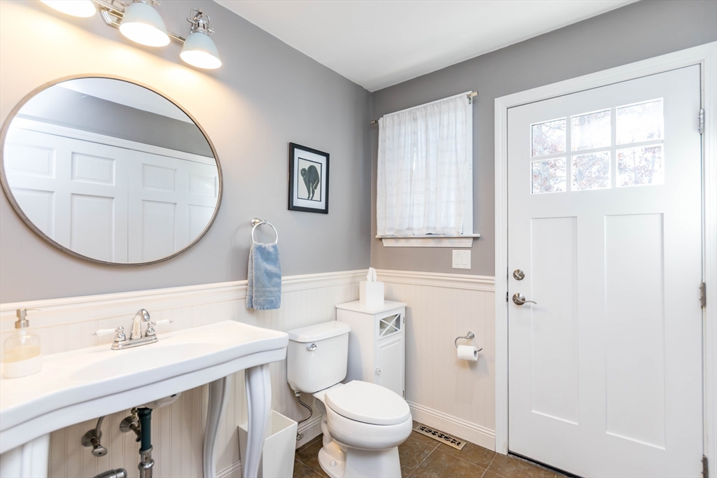 2 Blackmore Pond Circle Wareham, MA 02576 - Photo 18 of 42 a bathroom with a toilet a sink and a mirror