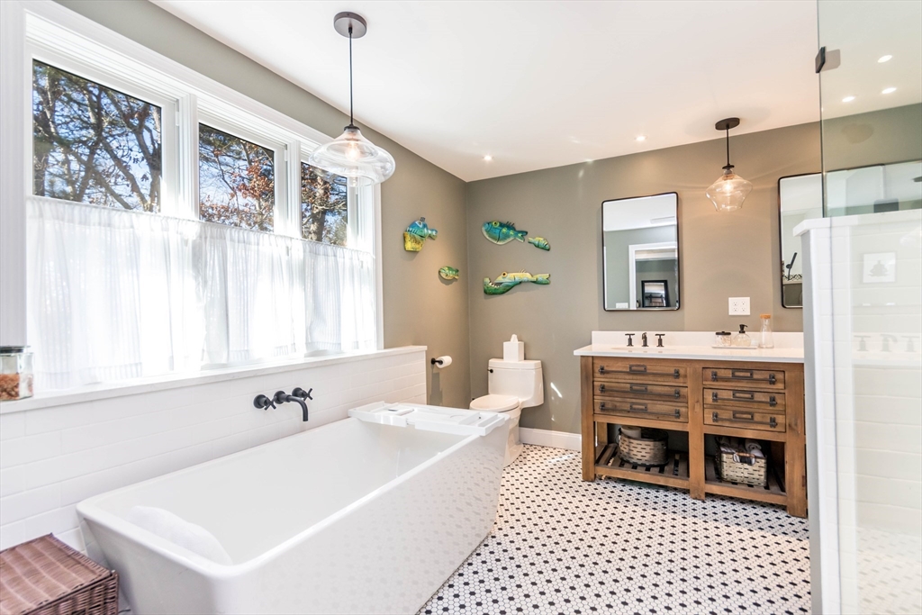 2 Blackmore Pond Circle Wareham, MA 02576 - Photo 21 of 42 a spacious bathroom with a sink double vanity and a bathtub