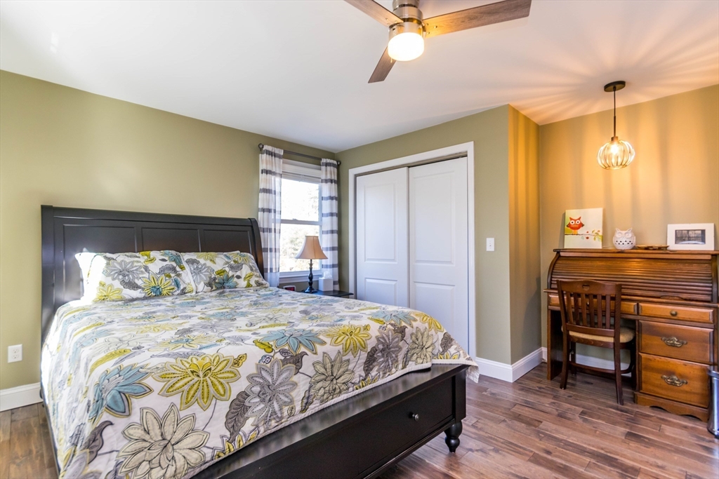 2 Blackmore Pond Circle Wareham, MA 02576 - Photo 26 of 42 a bedroom with a bed and a dresser