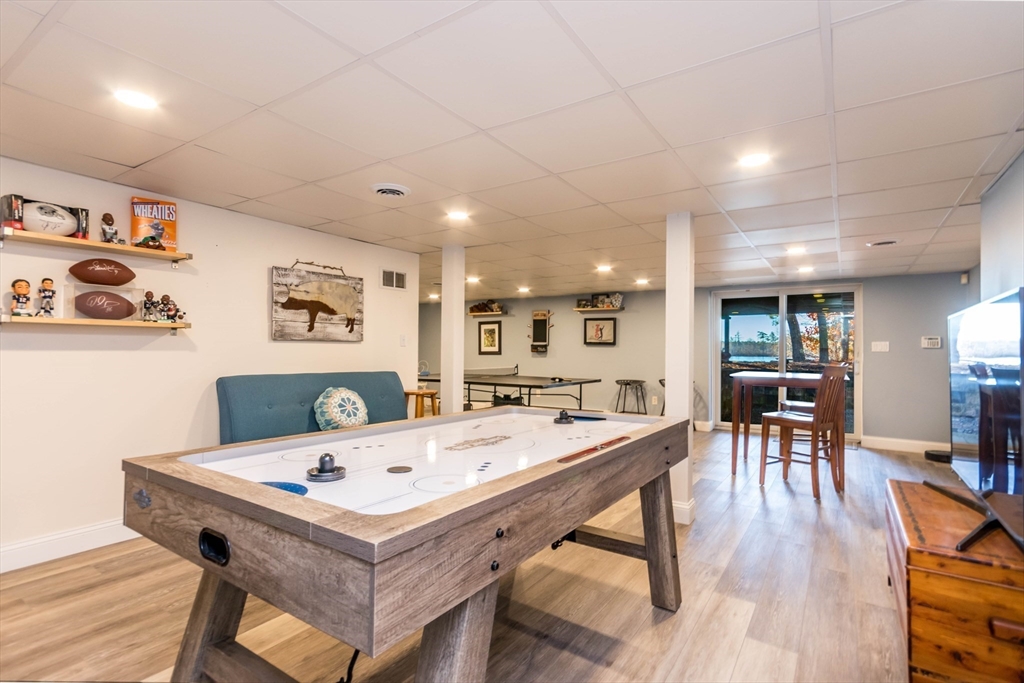 2 Blackmore Pond Circle Wareham, MA 02576 - Photo 31 of 42 a view of a dining room with furniture and wooden floor
